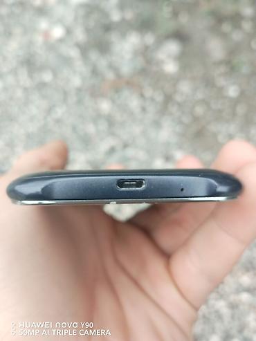 007 first light: Samsung Galaxy J1 Duos, rəng - Qara, İki sim kartlı — 2