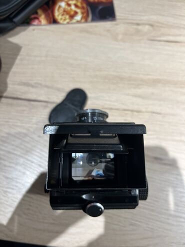 Фотоаппараты: Советский среднеформатный двухобъективный зеркальный фотоаппарат ЛОМО — 4