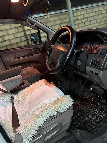 e6 3: Isuzu Filly: 2001 г., 3 л, Автомат, Дизель, Минивэн — 7