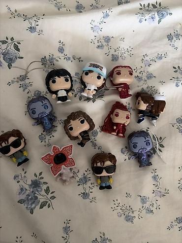 Брелоки: Набор мини‑брелоков/фигурок Funko (формат Pocket/Keychain) по сериалу — 1