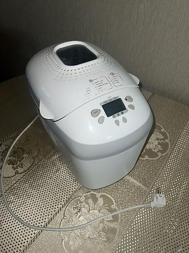 corek bisiren soba: Elektrik çörəkbişirən aparat - Rəng: ağ - Üst qapaqda baxış pəncərəsi — 1