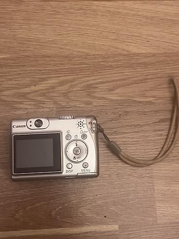 data nomre: Canon PowerShot A530 rəqəmsal fotoaparat. Kompakt gövdəyə malik bu — 3