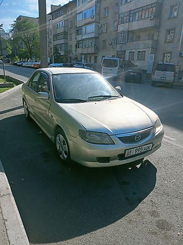pantera sliv: Mazda 323: 2002 г., 1.6 л, Механика, Бензин, Седан — 6