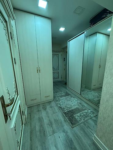 sarayda yeni tikilen binalar: Təsvir: Şık dizaynlı, geniş və işıqlı mənzil interyeri. Zal — 3