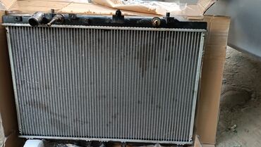 Радиаторы: Продаю радиатор Одиссея р1 почти новая только крышка сломана