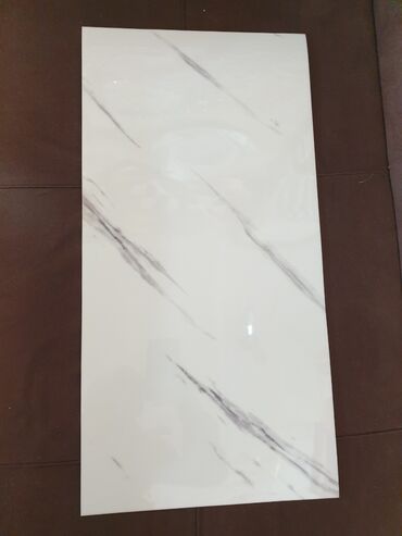 mebel vinilleri: 30/60 yapisqanli pvc Istifadesi cox rahatdir Mebel arasi kafel kimi
