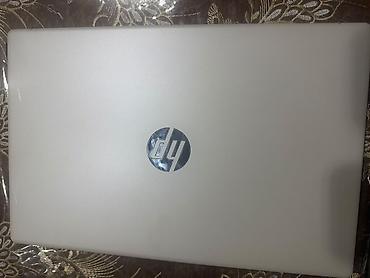 mini notebook: HP noutbuk satılır. Korpus gümüşü rəngdədir, zərif və müasir dizayna — 2