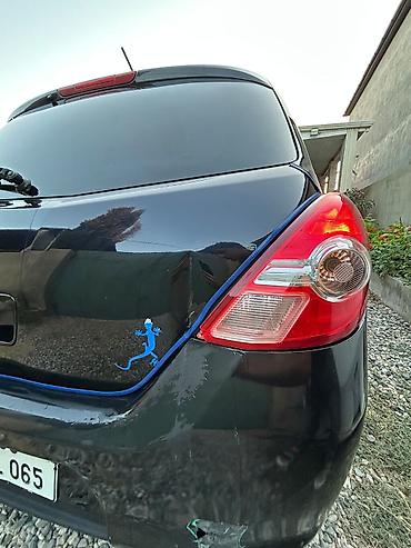 Транспорт: Nissan Tiida: 1.5 л | 2011 г. Хэтчбэк — 4