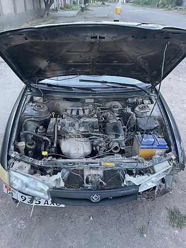 e klass: Mazda 626: 1994 г., 2 л, Механика, Бензин, Седан — 6
