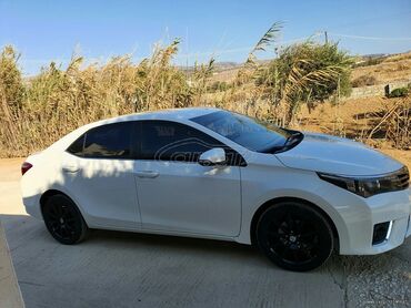 Toyota: Toyota Corolla: 1.4 l. | 2015 έ. Sedan — 4
