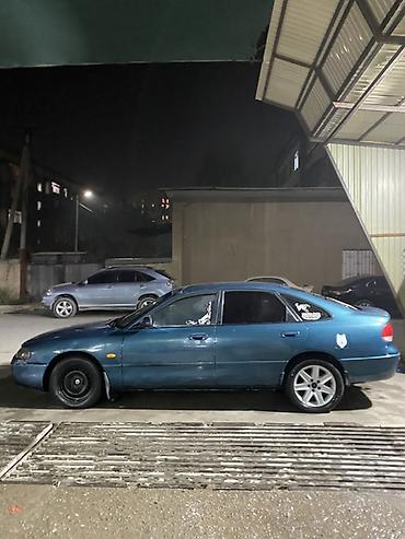 volvo 6×2: Mazda 626: 1993 г., 1.8 л, Механика, Бензин, Хэтчбэк — 4