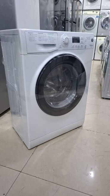 par utusu: Ön yükləməli paltaryuyan maşın - Rəng: ağ, iri dairəvi şəffaf lyuk