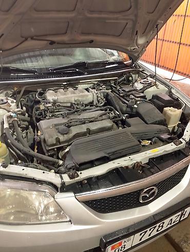 х5 м: Mazda Familia: 2001 г., Бензин, Универсал — 8