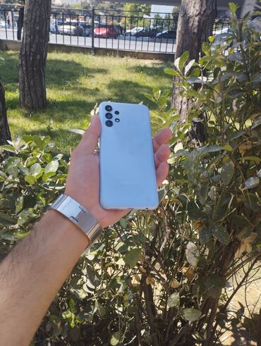 sq90 телефон: Samsung Galaxy A13, 64 ГБ, цвет - Голубой, Кнопочный, Отпечаток пальца, Face ID