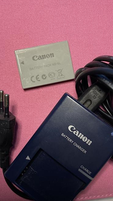 Canon PowerShot SX210 IS fotoaparatı satılır. Qızılı rəngdədir, çox az — 6