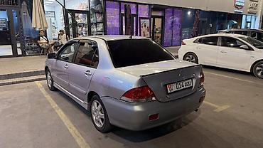мотор на лансер: Mitsubishi Lancer: 2005 г., 1.6 л, Автомат, Бензин, Седан — 5