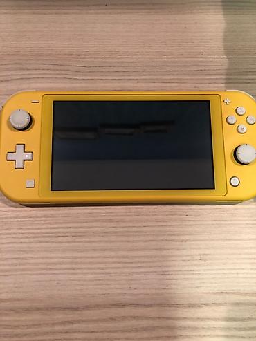 Nintendo Switch Lite (Yellow) + Original Adapter Vəziyyəti: Yaxşı