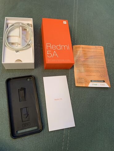 Xiaomi Redmi 5A, 16 ГБ, цвет - Золотой, 
 Сенсорный, Две SIM карты, С документами