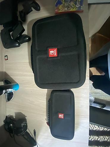 Nintendo Switch: Продается Nintendo switch Oled. В комплекте 4 игры: Mario party / — 5