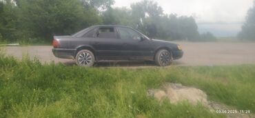 купить диски r16 4x114.3: Черный седан Audi, оснащенный литыми дисками. Автомобиль имеет