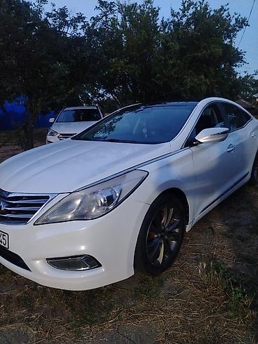 ucuz kamazlar: Hyundai Azera: 2.4 l | 2011 il Sedan — 2