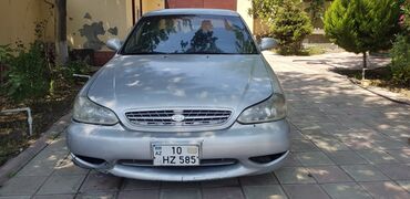 opel astra qiymeti: Kia Clarus: 2 l | 1999 il Sedan