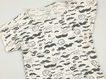 ocieplane legginsy 134: T-shirt, M, stan - Dobry