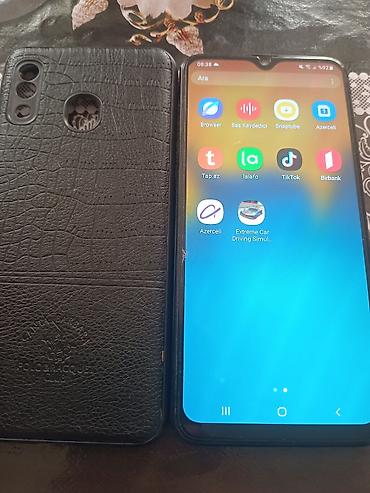 Мобильные телефоны и аксессуары: Samsung Galaxy A20, 32 ГБ, цвет - Черный, Отпечаток пальца — 1
