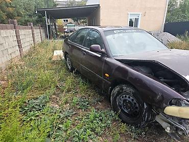 ручка бмв: Mazda 626: 1994 г., 1.8 л, Механика, Бензин, Седан — 1