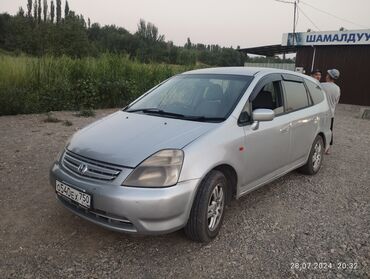 матиз на вариант: Серебристый минивэн Honda Stream. Подходит для семейных поездок и