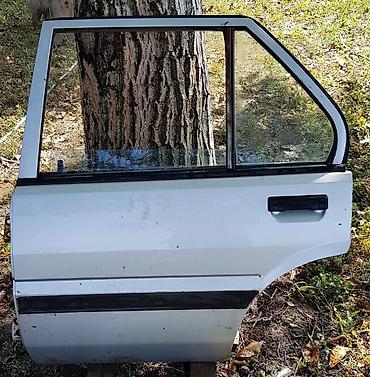 N13/SED/4V VRATA ZADNJA L. ZA NISSAN SUNNY OD 1987. DO 1992. GOD na lalafo.rs N13/SED/4V VRATA ZADNJA L. ZA NISSAN SUNNY OD 1987. DO 1992. GOD