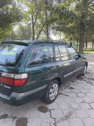 х2 00: Mazda Capella: 2000 г., 2 л, Механика, Бензин, Универсал — 6