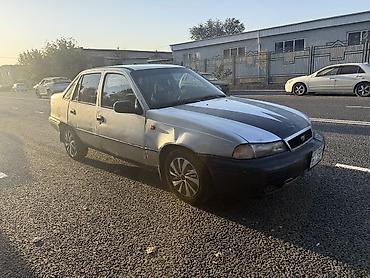 bmw 5 e39: Daewoo Nexia: 2001 г., 1.5 л — 1