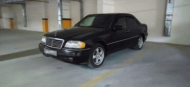 Mercedes-Benz: Mercedes-Benz 220: 2.2 l | 1995 il Sedan