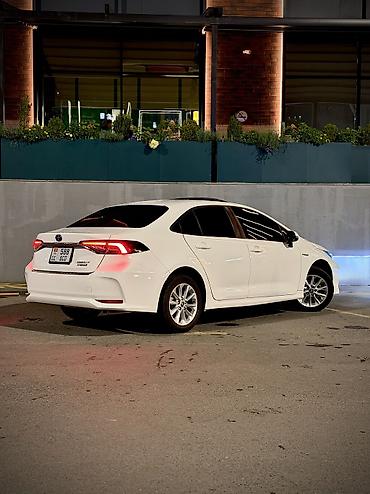 Toyota: Toyota Corolla: 2019 г., 1.8 л, Вариатор, Гибрид, Седан — 4