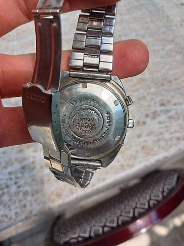 orient gence: Orient brendinin gümüşü rəngli polad bilərzikli qol saatı. Bu model — 2