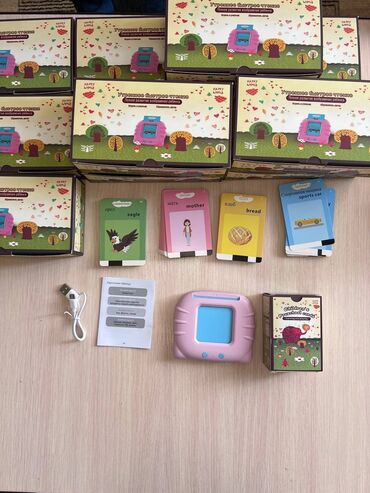 оптом детские игрушки: Русско-англ говорящий планшет для детей Ест зарядка Цвет: розовый и