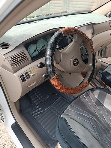 авто духи: Toyota Corolla: 2002 г., Бензин, Седан — 8