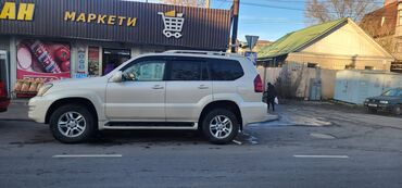 lexus gx запчасти: Внедорожник Lexus GX 470 бежевого цвета. Автомобиль имеет просторный