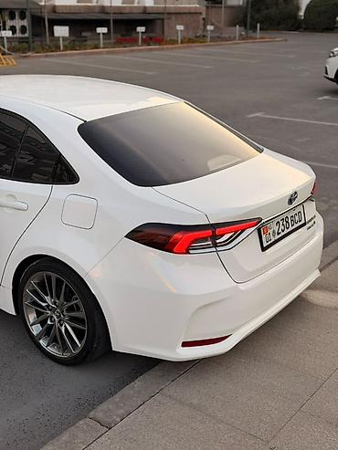 гибрид бензин: Toyota Corolla: 2022 г., 1.8 л, Автомат, Гибрид, Седан — 5