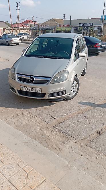 Opel: Opel Zafira, gümüşü rəng, 7 yerlik (3 cərgə oturacaq) minivan — 2