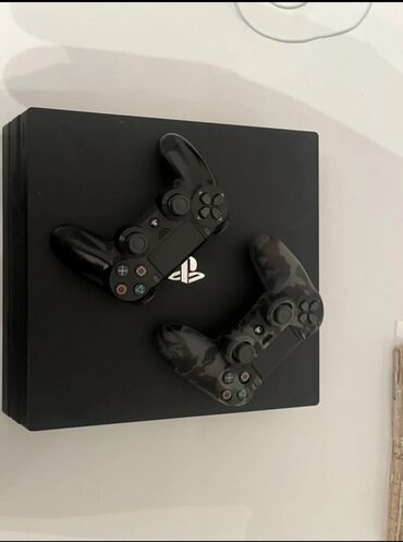 цена плейстейшен 4: PlayStation 4 Pro (черная) + 2 контроллера DualShock 4 Комплектация