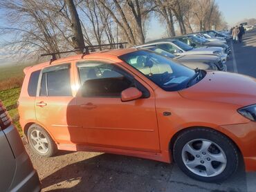 Mazda: Mazda Demio: 2003 г., 1.3 л, Автомат, Бензин, Седан