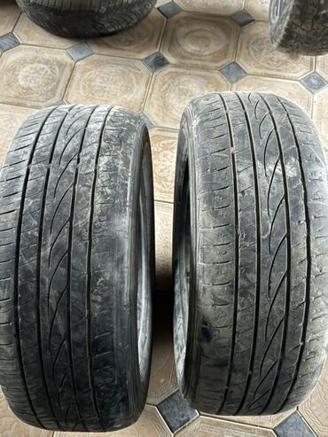 летняя резина 21560 r16: Две шины размером 235/60 ZR16 100W. Подходят для различных марок