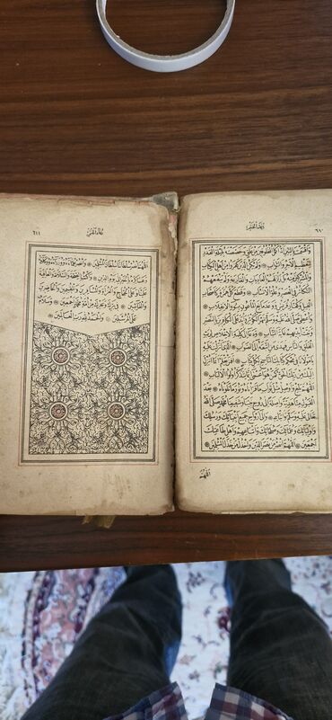 1 əsrdən çox yaşı olan qədim Quran kitabı satılır