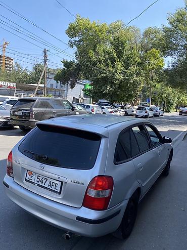 Mazda: Mazda 323: 2002 г. — 5