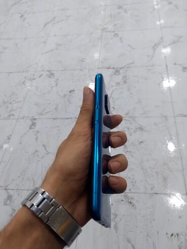 telefon altliqlari: Xiaomi Redmi smartfon - Model: Redmi (arxa hissədə “Redmi” loqosu