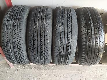 islenmis teker satisi: 4 ədəd yığılmış disk+şin komplekti əla vəziyyətdədiler pirus diskidi — 9