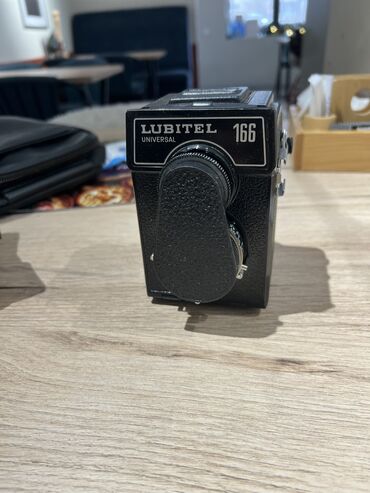 Фотоаппараты: Советский среднеформатный двухобъективный зеркальный фотоаппарат ЛОМО — 9