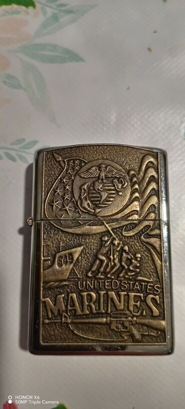 Breloklar: Metall korpuslu, benzinli (şamlı/fitilli) qapaxlı alışqan. Ön paneldə -da lalafo.az — 4 Breloklar: Metall korpuslu, benzinli (şamlı/fitilli) qapaxlı alışqan. Ön paneldə — 4